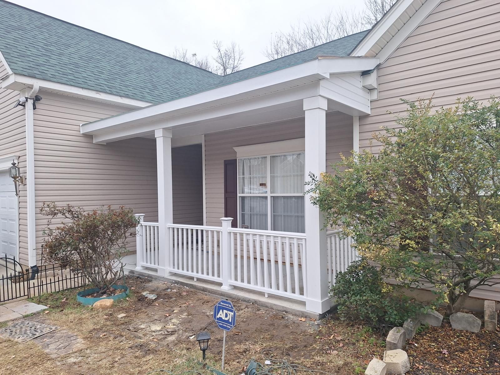 White railed front porch on a single-storey home
